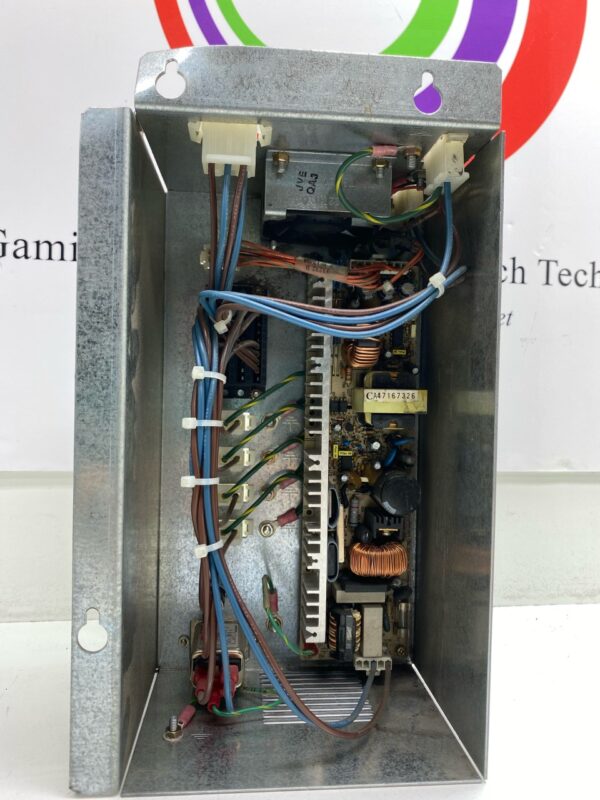 The inside of a metal box with 250V Power Supply, Generic. Part 33144 B. GETT Part PSUP213 and wires.