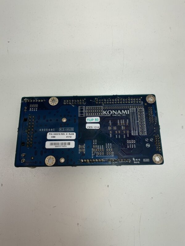 A Konami Reel Driver Board for Konami Gaming- Konami Part 530379D. GETT Part RDB106 on a white surface.