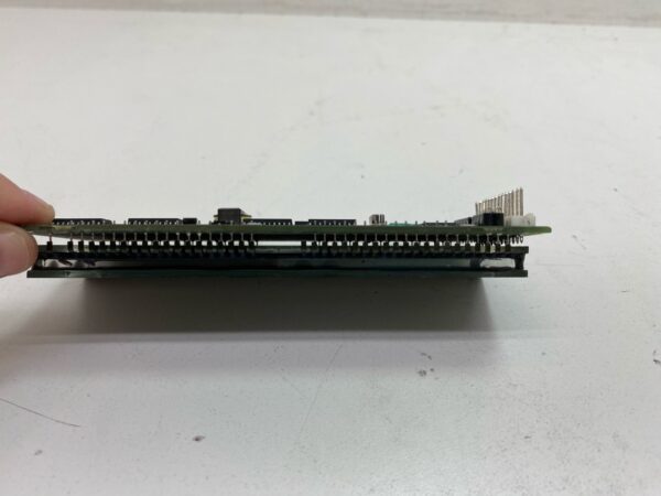 A person is holding a Replacement Dot Matrix VFD, IEE 2x20 Display. Replacement part for Bally 02S-93290-VFD. GETT Part VFD106