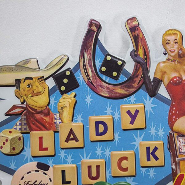 A Las Vegas Lady Luck Embossed Metal Wall Decor Sign for Bar, Garage or Man Cave with the word lady luck on it.