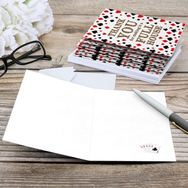 Las Vegas - Casino Party Thank You Cards (8 Count) and a pen on a table.