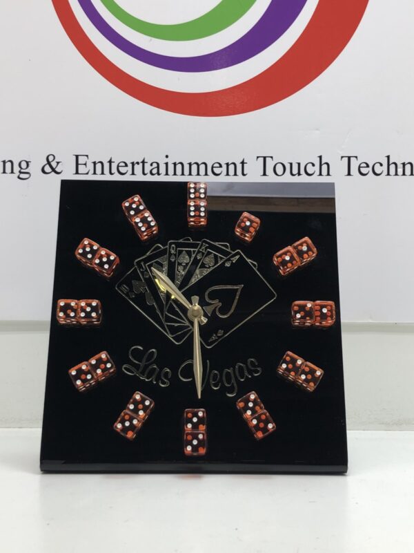 A Custom Las Vegas Dice Clock with the words entertainment touch technology.