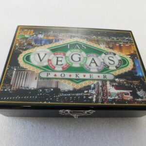 A black box with a 2 Decks of Poker Cards in Fancy Las Vegas Gift Box on it.