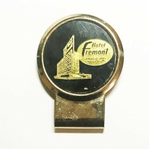An Old Fremont Hotel Money Clip with an image of a building on it. Unique and one of a Kind.