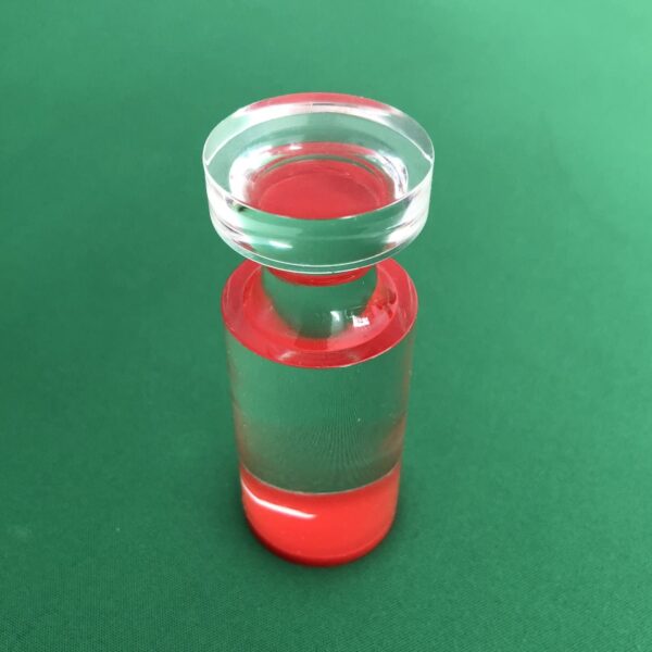 A Roulette Win Marker. GETT Part CQT104, clear glass bottle with red liquid in it.