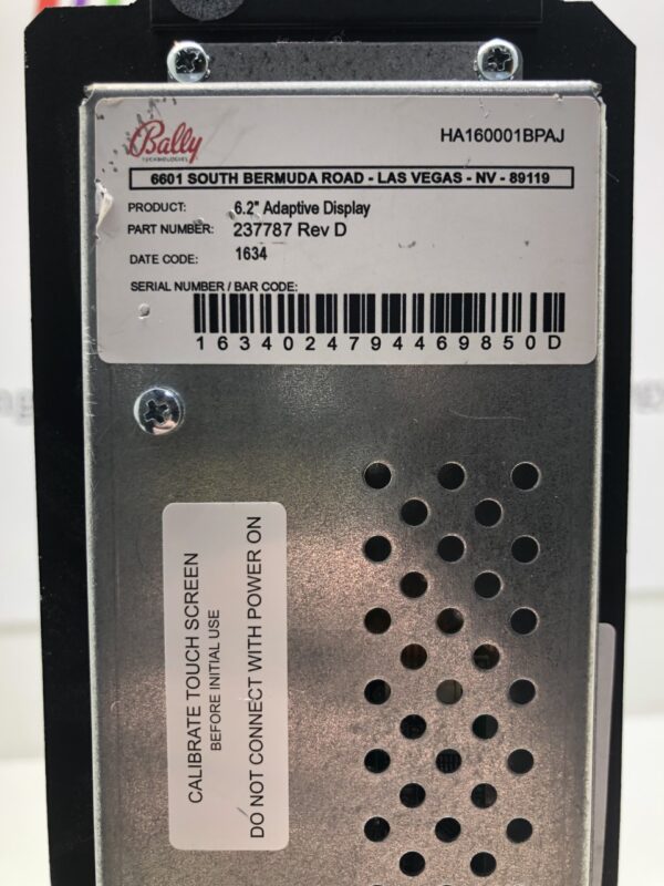 The back of a Player Tracking unit with a label on it for use with Bally Systems. Bally Part 237787 Rev D. GETT.