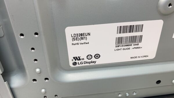 The back of a LG 32" LED Panel with a label on it.
