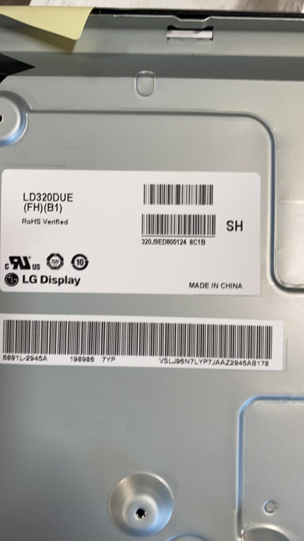 The back of a 32" LCD Panel, LG Brand with a bar code on it.