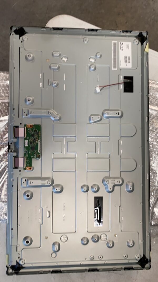 The back of a 32" LCD Panel, LG Brand with a lot of electronics on it.