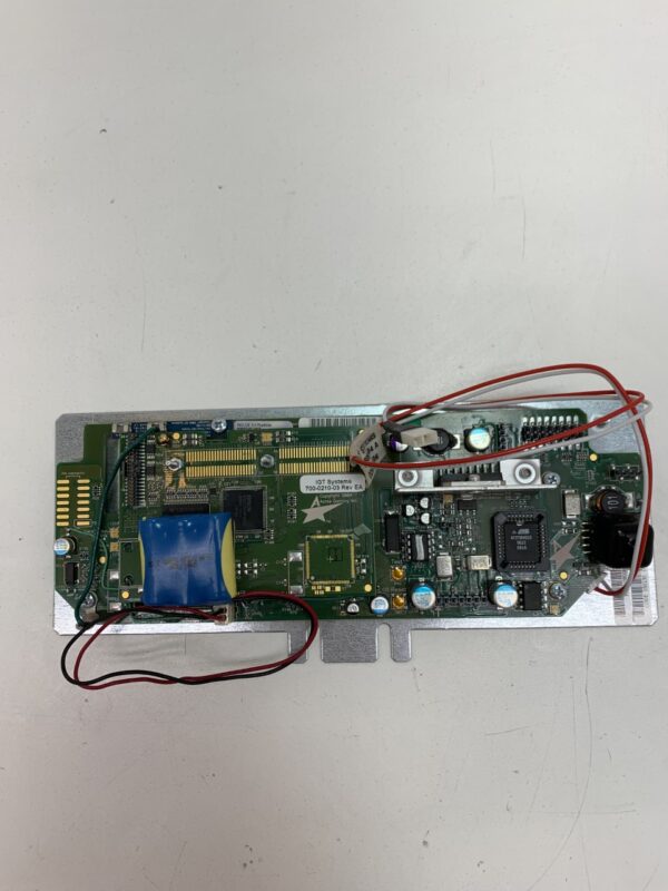 A small electronic board with wires attached to it, IGT Systems, ACRES PTU.