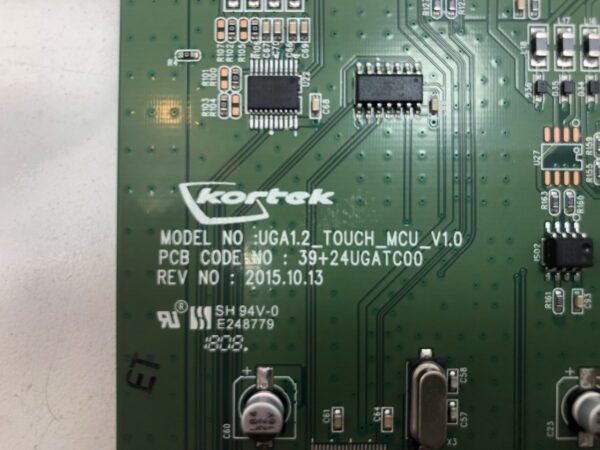 A green Kortek Touch Control/ MCU board with a number of electronic components on it.