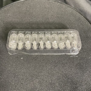 A clear plastic container with a number of Light pro LED assembly replacement for F1 GETT Part LAMP191 in it.