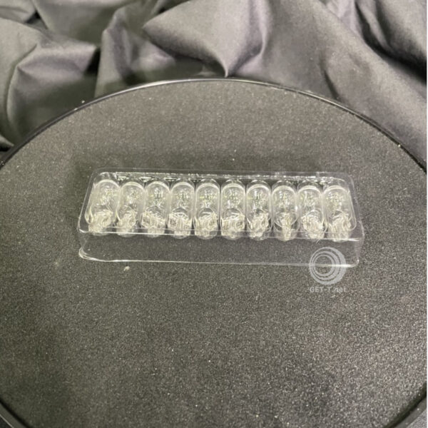 A clear plastic box containing a number of small Light pro LED assembly replacement for F1 GETT Part LAMP191 crystals.