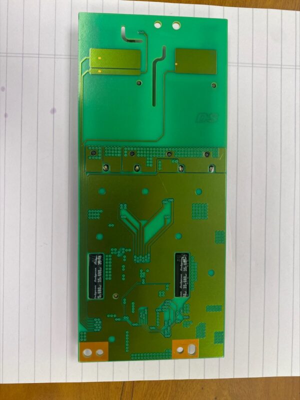 A green Inverter for LG LCD Monitor. NEW. Part 6632L-0496C. GETT Part INVT309 board on top of a piece of paper.