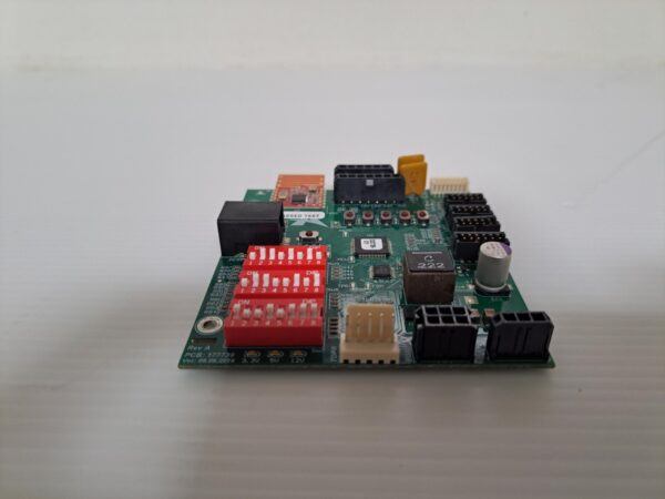 A small Power Control Board on a white surface.