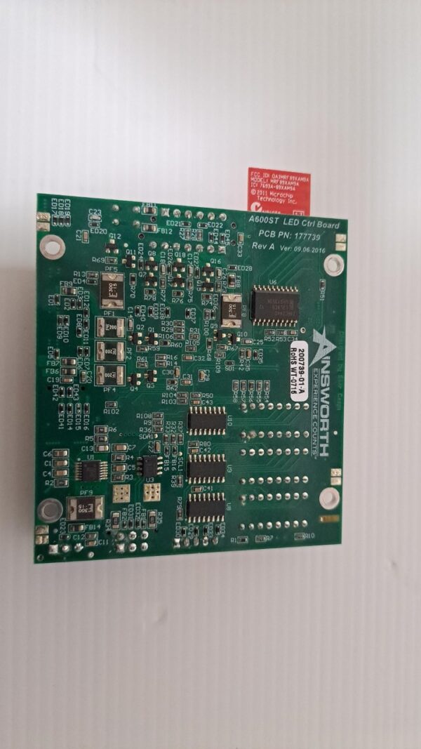 A Power Control Board (PCB) for use with Ainsworth A560 Games, Others is placed on a white surface.