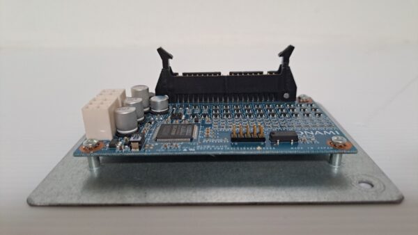 A Power Control Board for use with Konami Gaming Slot Machine, Konami Part 530242 and GETT Part PCB125, on top of a table.