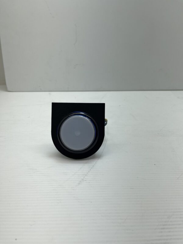 An EVERI HDX Core Spin Button on a white surface.