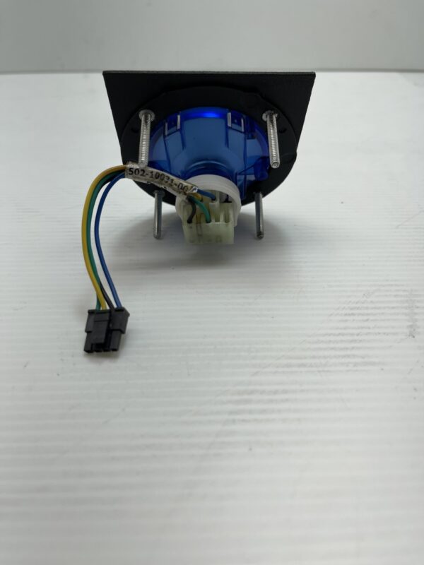 A small EVERI HDX Core Spin Button with a blue wire attached to it. Everi Part 502-10031-00. GETT Part BTN214.